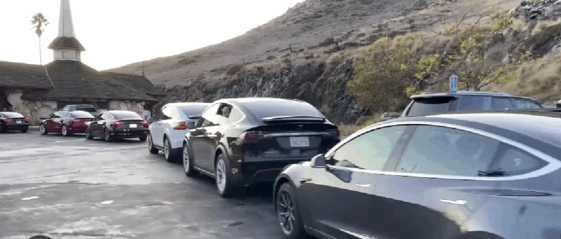 Tesla Model 2 First Supercharger with Magic Dock CCS Adapter charges up a Rivian 33504AFF-383E-42A7-AFF1-C214759E155E