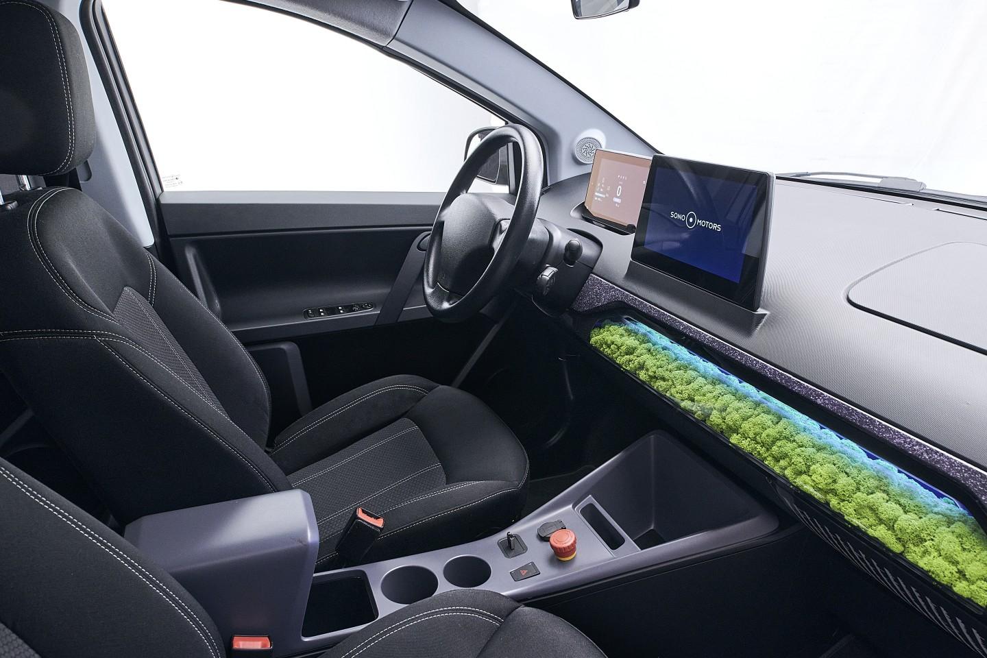Tesla Model 2 Sono Unveils New Solar-powered Car Prototype 4f47d08cc2242c4c389453%2Fsono-motors-sion-interior