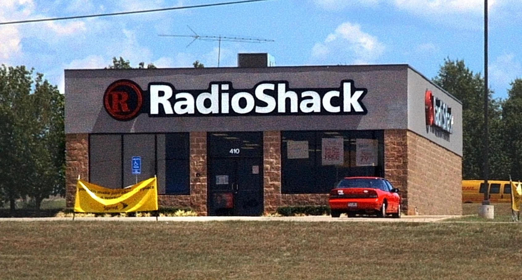 Tesla Model 2 John Deere buys Kreisel Electric, plans to electrify its lineup RadioShack_Exterior_Modified