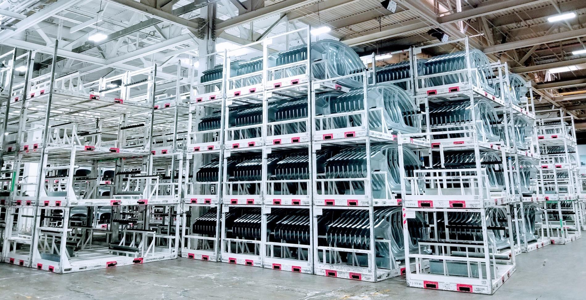 Tesla Model 2 Elon Musk: “Tesla’s Long-Term Competitive Advantage Will Be Manufacturing” tesla-fremont-factory-body-parts-press-storage