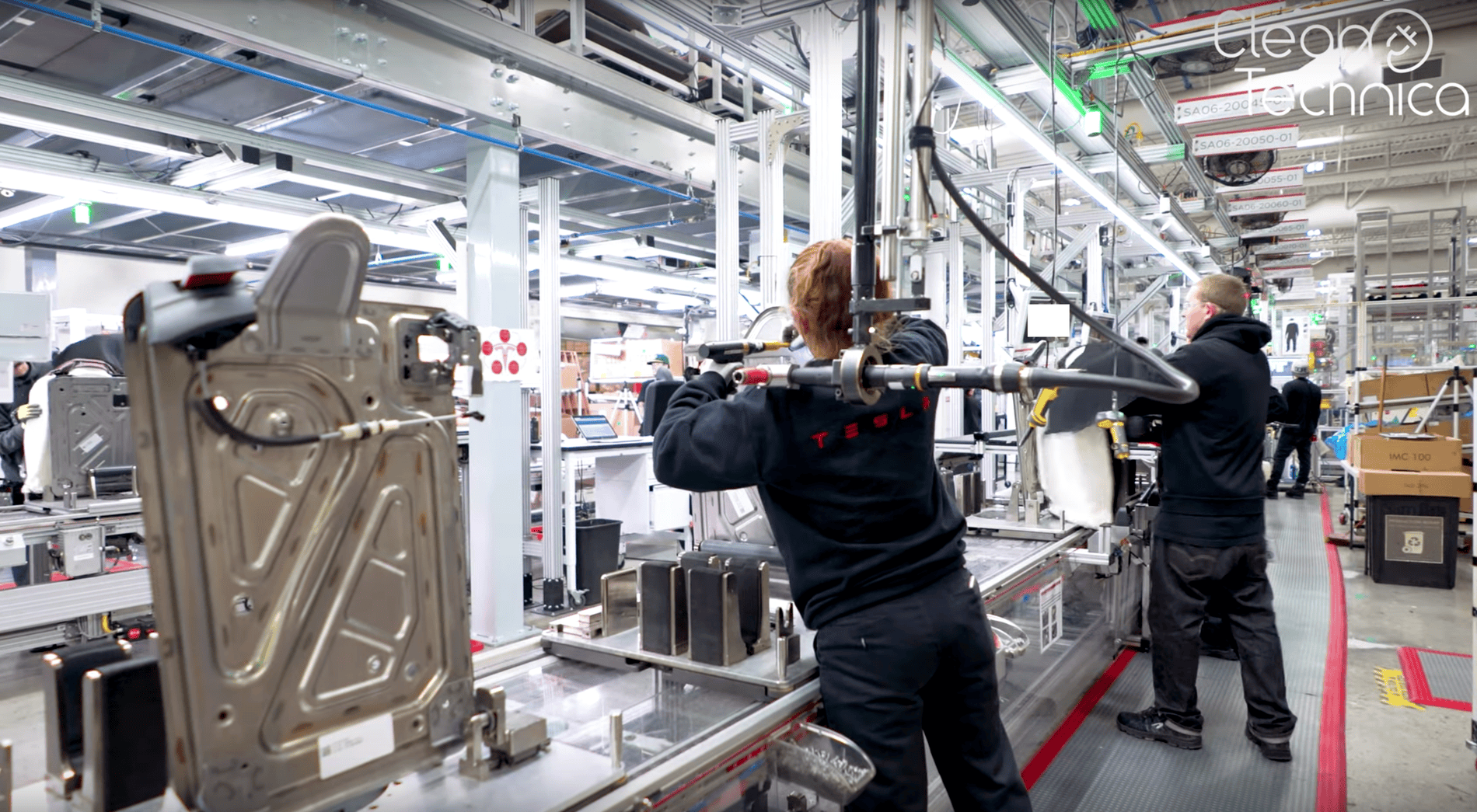 Tesla Model 2 Elon Musk: “Tesla’s Long-Term Competitive Advantage Will Be Manufacturing” Tesla-Fremont-seat-factory-fresh-100